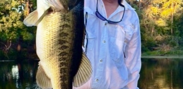 Ray McKinney with a 10 pound beauty he caught at Laneville - Hidden Springs Ranch.