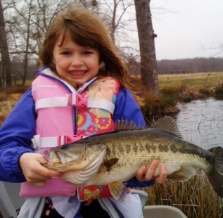 Mike Abbots daughter holds her personal best at Ben Wheeler Twin Lakes. At this rate, she will be catching 10 pounders by the time she is 10 years old!