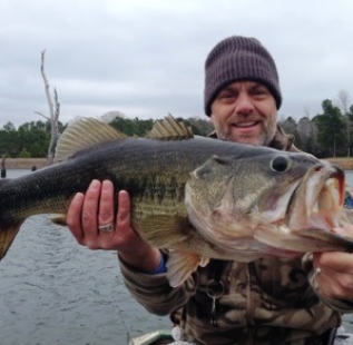 Shaun Cobb with a 9 pound toad caught at Gilmer - Hat and Star