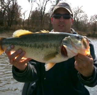 Jon Waters with a 6 lb plus fish caught on an early spring day at Decatur Beaver Lake.