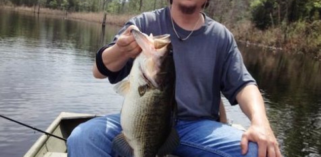Adam Edwards holds a 7 pound, 14 ounce beauty caught at Ben Wheeler Twin Lakes.