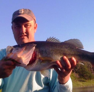 Kevin Sweet holds his birthday gift from his father. An 8 pounder caught at San Saba Waco Creek Ranch. Happy Birthday indeed!