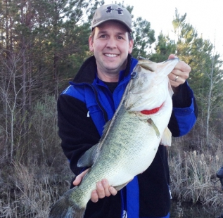 Trip Snugss holds a personal best, 10 plus pounder at Longbranch Yates Place.